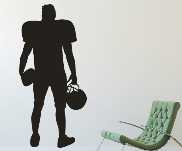 Wandtattoo Sportschatten | Ein American Footballspieler mit Helm und Football als Silhouette günstig kaufen